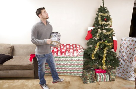 Curvy blonde cougar in stockings gets shagged under the Christmas tree