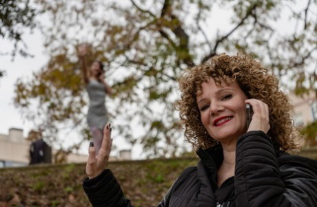 Curly haired woman has strapon lesbian sex with her stepdaughter