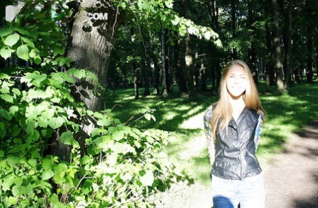 Slim amateur uncovers her small tits in blue jeans during homemade action