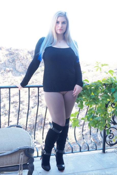 Big busty amateur Danielle drops riding pants to toy fatty twat on the terrace
