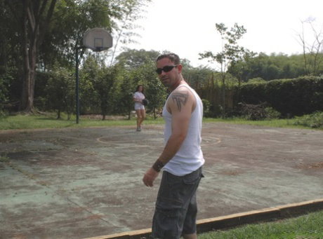 Latina MILF Carolina bangs an athletic young man on an outdoor court