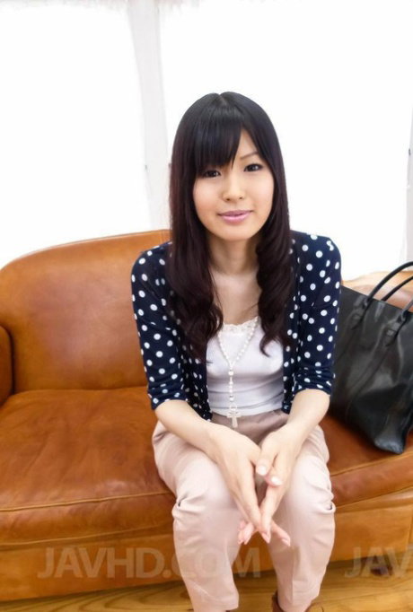Japanese girl Nozomi Koizumi gets some assistance while masturbating