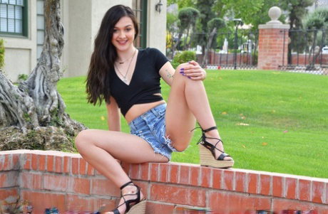 First timer April flashes in public before pleasuring her pussy indoors