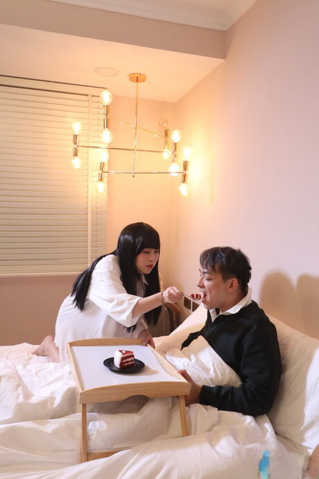 Japanese girl Jiu Jiu gets banged on a bed in sensual lingerie