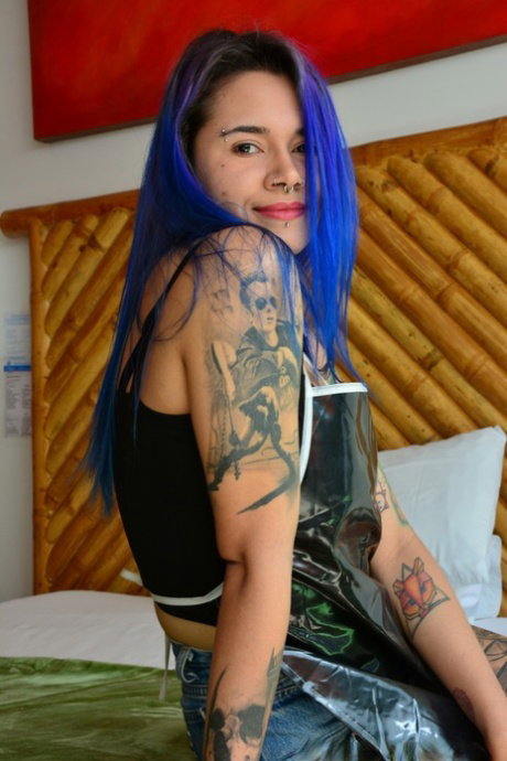 Kinky purple haired Colombian chick fucks a black dude at the meat market