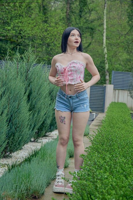 Dark haired teen Virgin Butterfly finger spreads her pink pussy on a kitchen tab