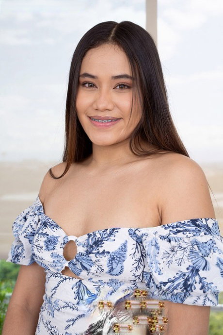 Alluring beauty Ellen Carrison shows her tits and panties while eating berries