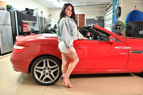 Latina amateur Katarina gets naked on a motorcycle in a garage