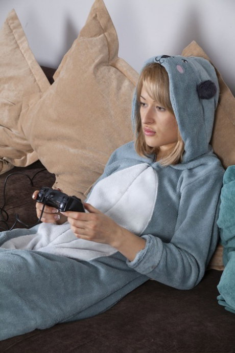Skinny MILF Little Angel loses her kigurumi outfit and spreads her hairy twat