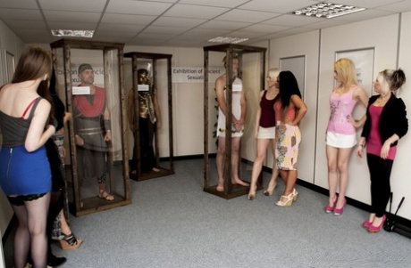Female visitors to an interesting museum are treated to naked men jerking off