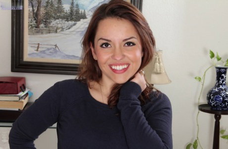 Latina amateur Alina Garcia wears big smile on her pretty face while disrobing