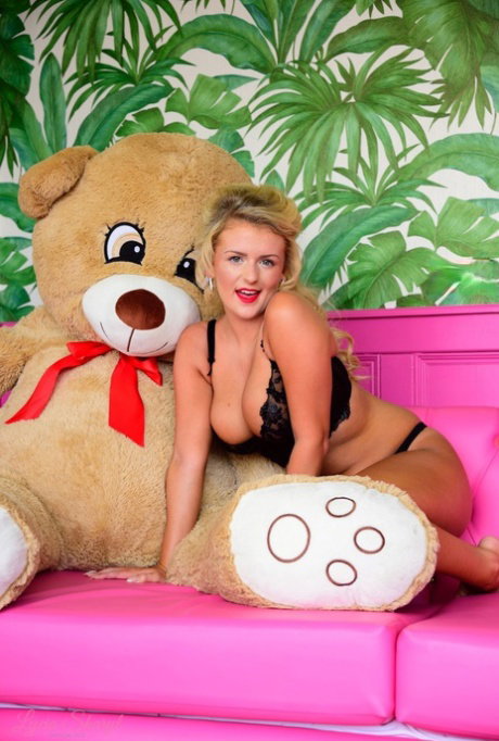 British teen Lycia Sharyl uncovers her great tits next to a stuffed animal