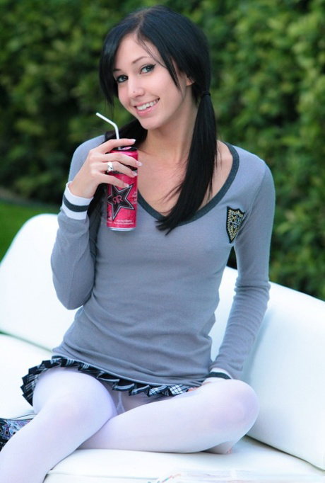 Schoolgirl Catie Minx pulls down her leotards during her lunch break