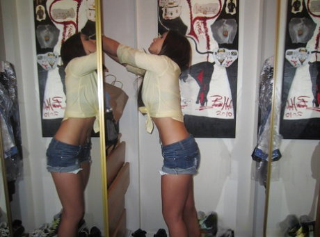 Clothed Latina bitch Giselle Leon is showing off in her jeans shorts