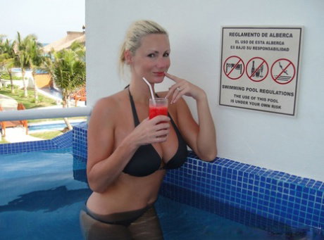 Big titted blonde Allie finger fucks after lounging in a swimming pool