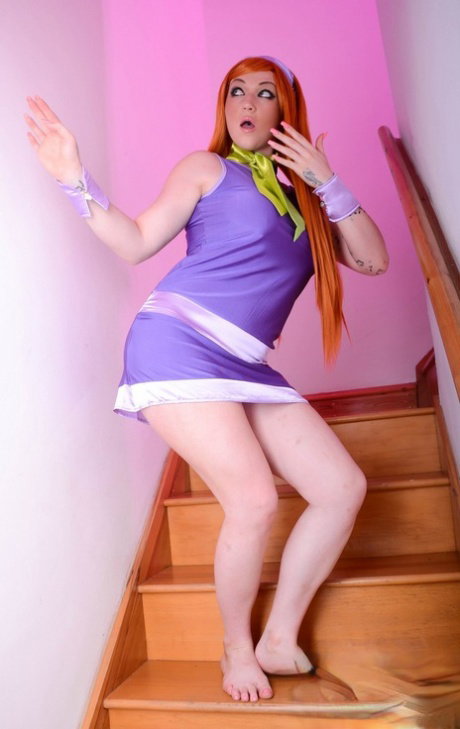Cute redhead Harmony Reigns has sex on the stairs in a cosplay outfit