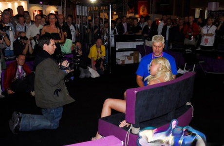 Blonde pornstar Bree Olsen exposing tits before live lesbian sex show