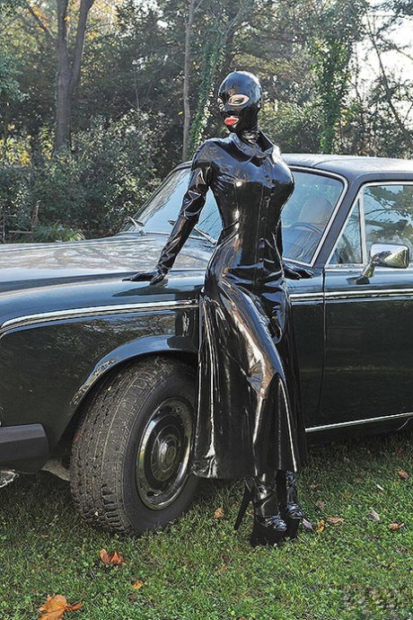 British girl Latex Lucy masturbates with a ribbed vibrator in a latex catsuit