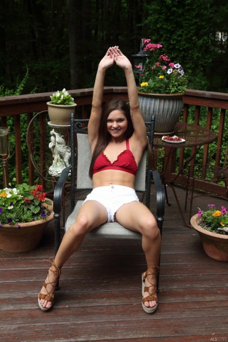 Pretty amateur babe Zoe Bloom unveils her cunt and small tits before toying