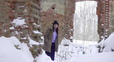 White girl Katya takes a badly needed pee upon pristine snow