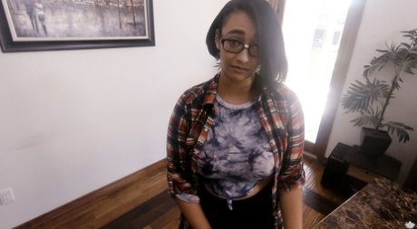 Glasses clad Emori Pleezer with big natural tits gives head on massage table