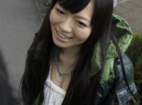 Slim Japanese girl Yuma Miyazaki gives her man friend oral sex in the bathroom