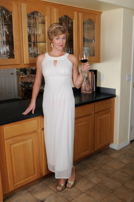 Elegant MILF Liz Sophia doffs gown to display sexy tiny tits and hot booty