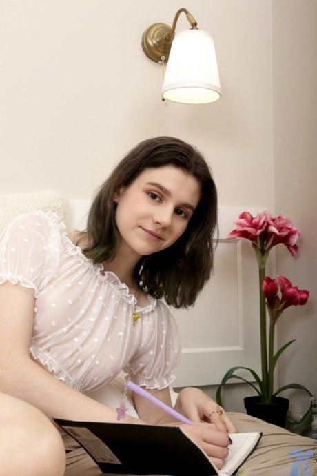 Sweet teen Little Lena toys her tight pink pussy after getting naked