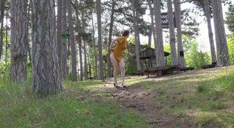 Caucasian girl Antonia Sainz squats for a piss while in the woods
