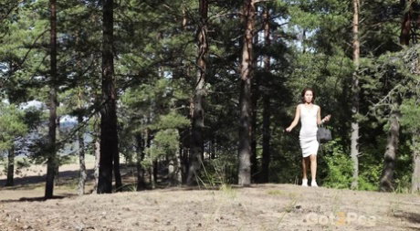 Caucasian girl Karolina takes a badly needed piss against a mature tree