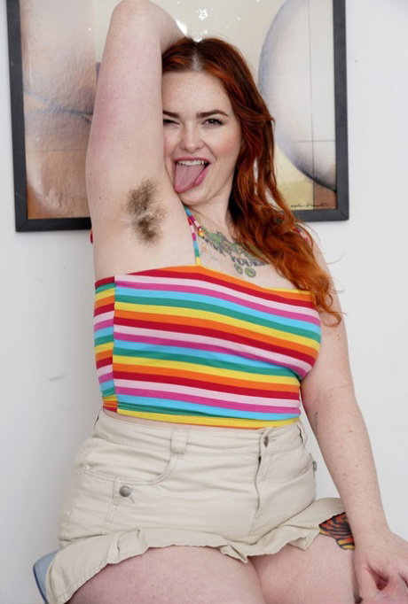 Charming chubby babe Adora Bell strips naked & spreads her hairy pussy