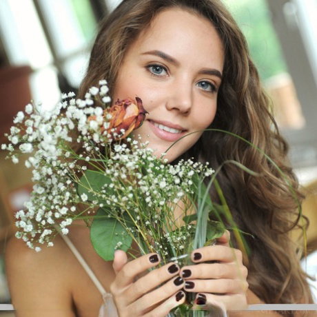 Sweet teen Mango A hops onto kitchen counter to show her beautiful nude body
