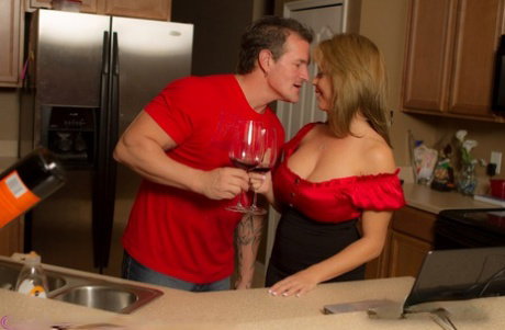 Busty chick Amber Lynn Bach drinks wine and licks the nut sac before fucking