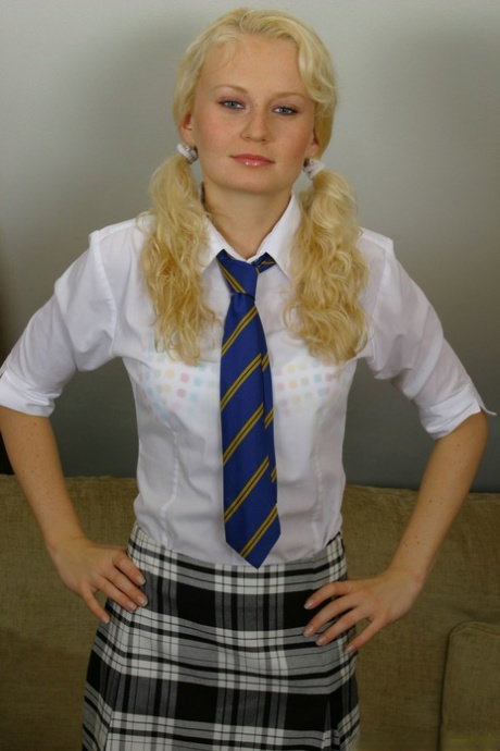 Cute blonde Karen undresses and shows her natural body in a solo