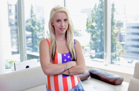 Petite patriotic blonde Darcie Belle flaunts her spectacular teen ass close up