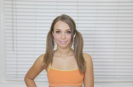 Petite pigtailed teen in braces Liza Rowe looks sweet on the end of a big cock