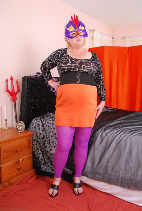 Dirty granny in purple pantyhose Fanny toying herself for a Halloween