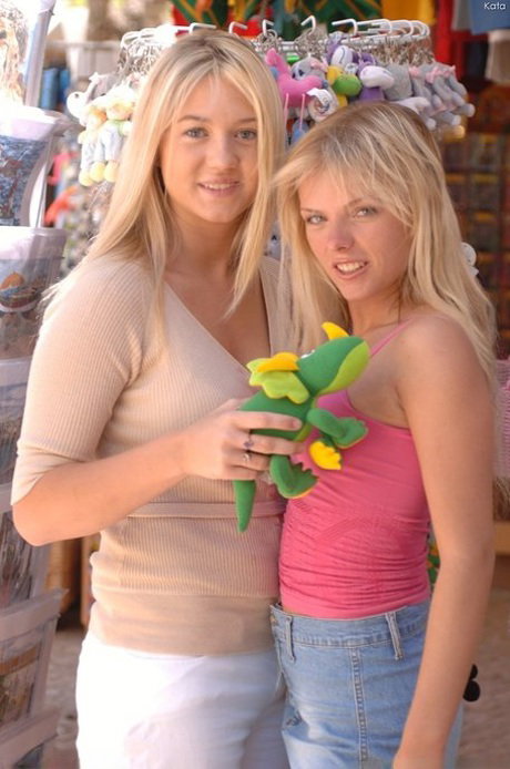 Glamour babe Kata & her lesbian girl friend flashing sexy tits in public