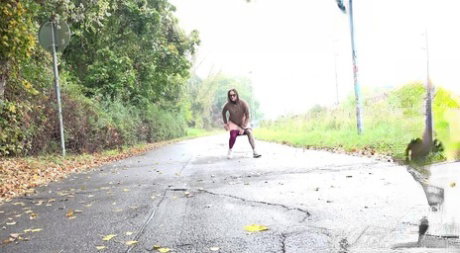 White girl Barbe takes a much needed piss on a paved road