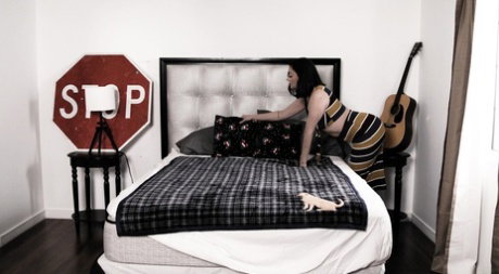 Dark haired woman Sovereign Syre attempts to get pregnant by her stepson