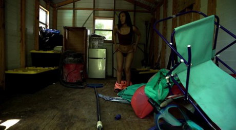 Asian chick Kimmy Kimm gets caught masturbating in a shed before hardcore sex