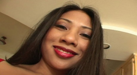 Asian MILF Nyomi Marcela takes a cumshot on her face after oral and vaginal sex
