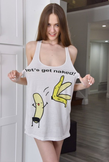 Nice teen Samantha Hayes slips out of a tank top to pose in the nude