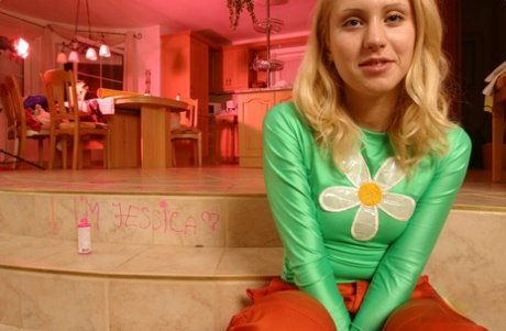 Amateur teen Jessika strips naked exposing her sweet tits & her shaved snatch