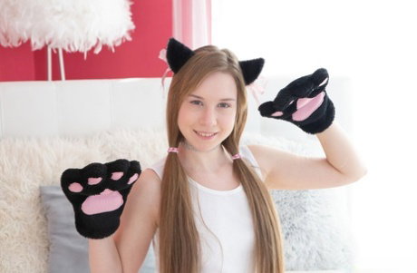 Teenage kitty Alice Klay licking and fucking her favorite toy on the bed