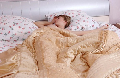 Sleepy teen Alena wakes up, shows her big boobs and rubs her snatch