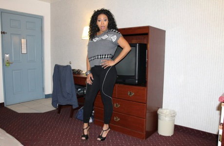 Cute ebony babe drops to her knees and sucks white dick like a real pro
