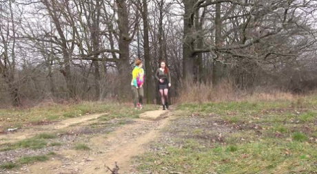 Redheads Chrissy Fox & Red Fox squat for a pee while taking a hike