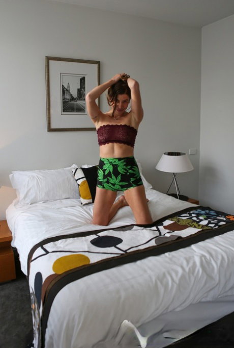 Brunette teen Lily B takes off her clothes, shows boobies and masturbates