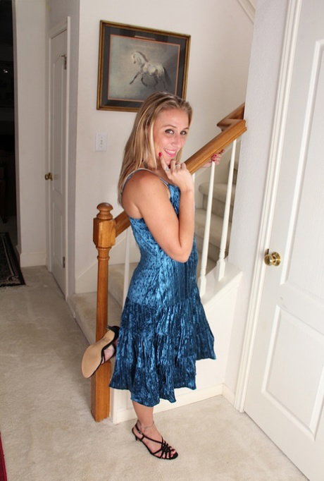 Clothed mature girl Sky is posing in her astounding black panties
